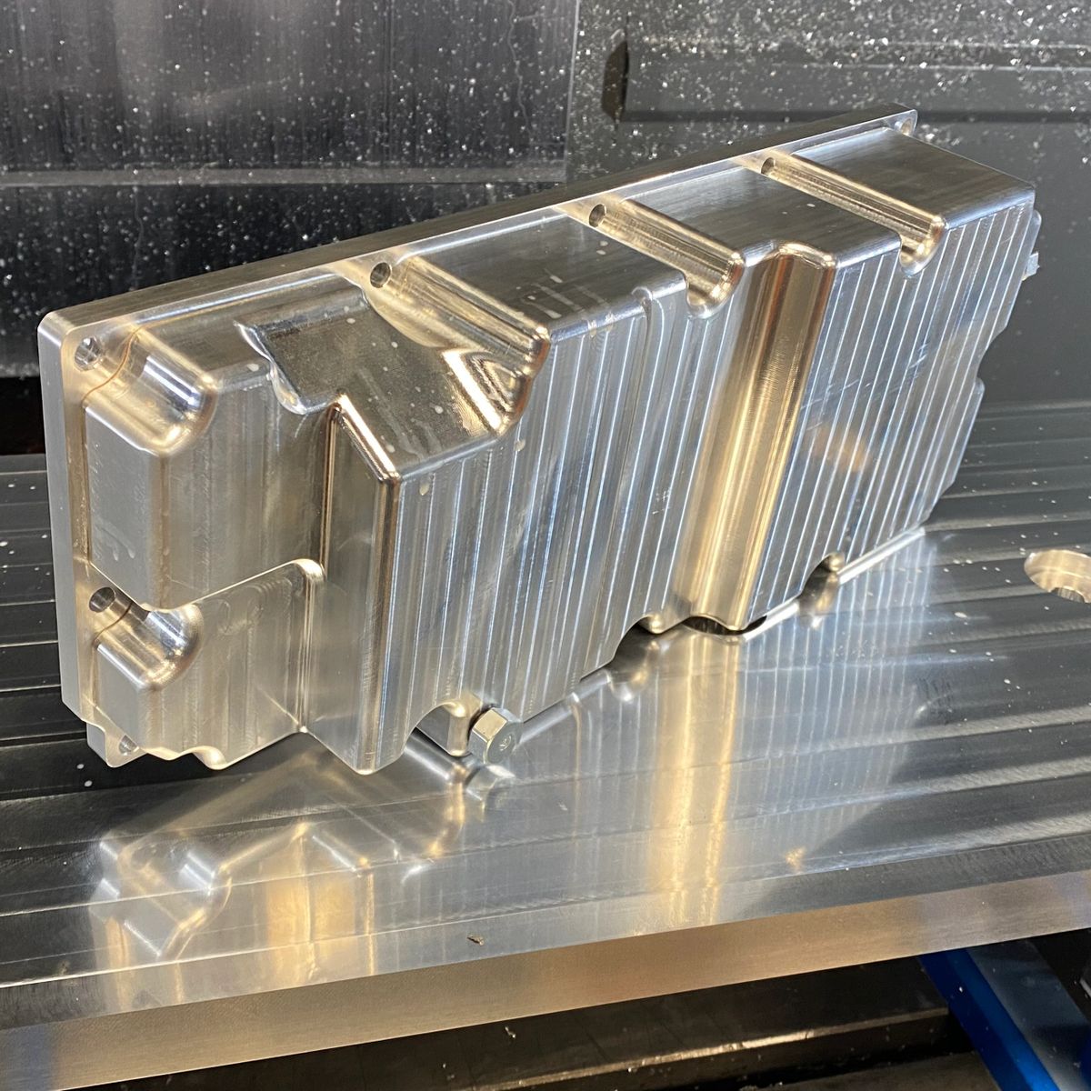 Twin Cam FXR oil pan, in raw machined aluminum finish.