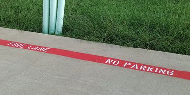 6" red Fire Lane stripe, 4" white "FIRE LANE NO PARKING TOW AWAY," Houston tx, Cypress, TX