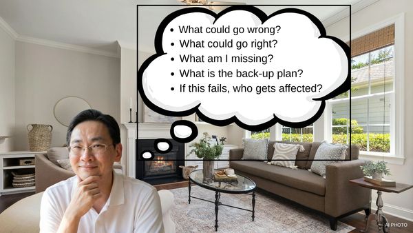 Man contemplating important questions in a cozy living room.