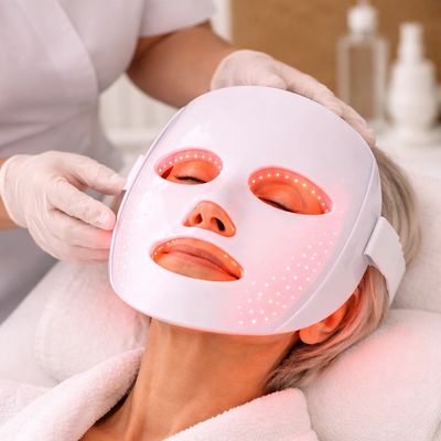 older lady getting an LED facial