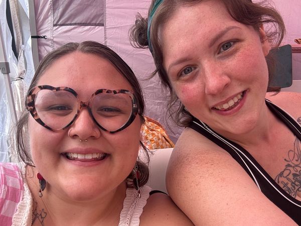Two smiling women posing for a selfie.