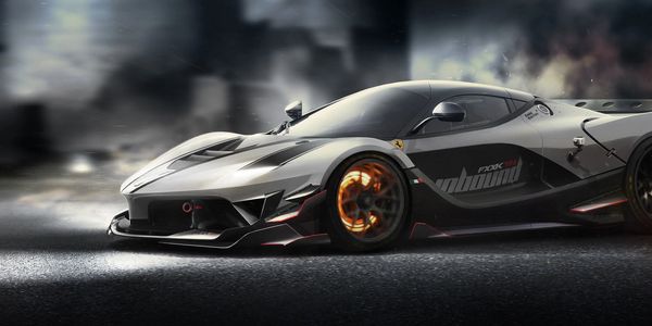 Sleek black sports car with glowing wheels.