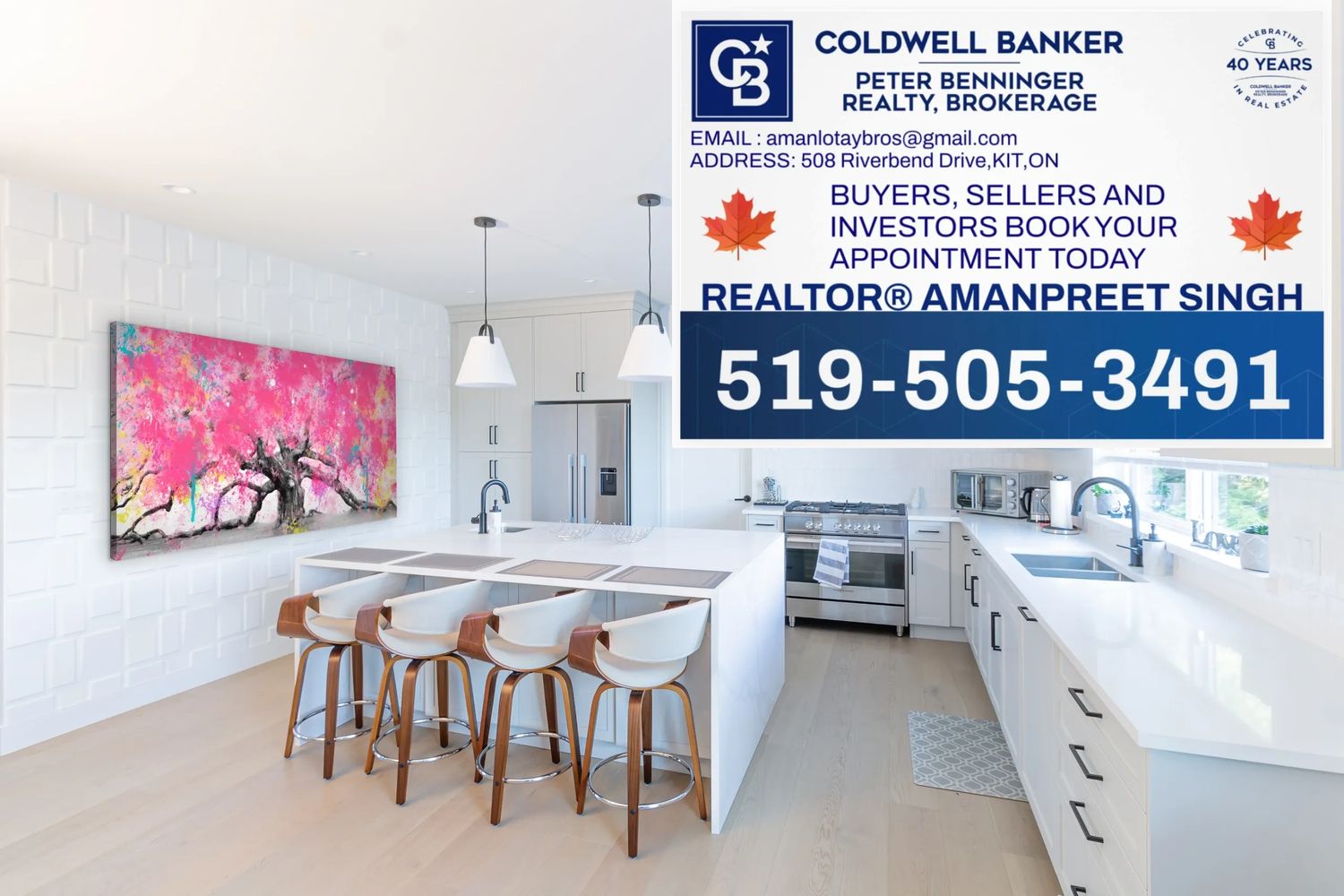 Modern white kitchen with a vibrant pink tree painting and wooden bar stools.
