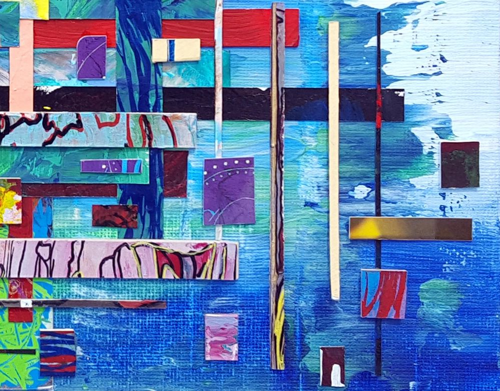Tetris Undone Blue painted background with multicolored various shaped mosaic tiles arranged loosely