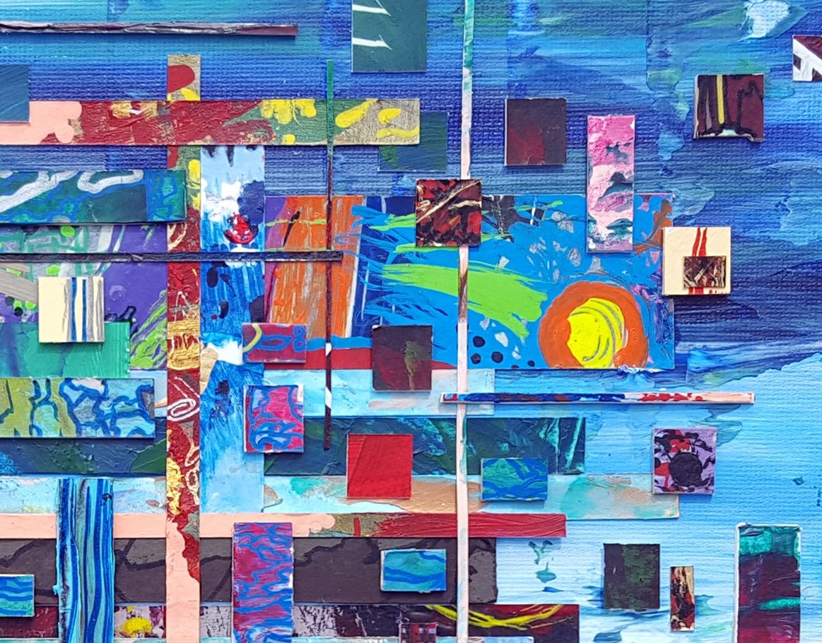 Tetris Undone Blue painted background with multicolored various shaped mosaic tiles arranged loosely