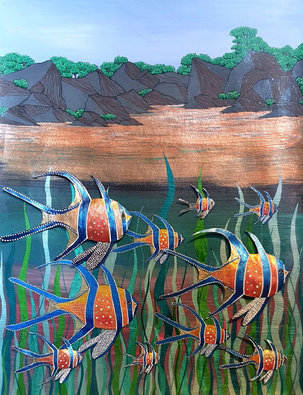 School of Fish A painting of a rocky shore with fish and reeds below. Some of the fish paper cutouts