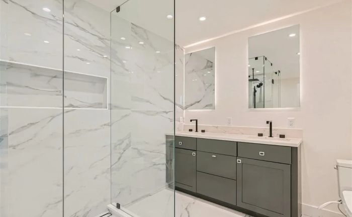 Minimalist bathroom with tile and shower