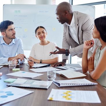 Group of people discussing business.