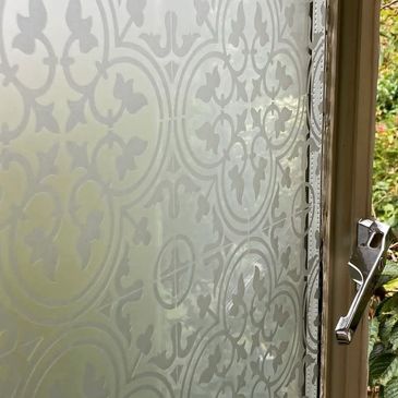 Patterned design window etch 