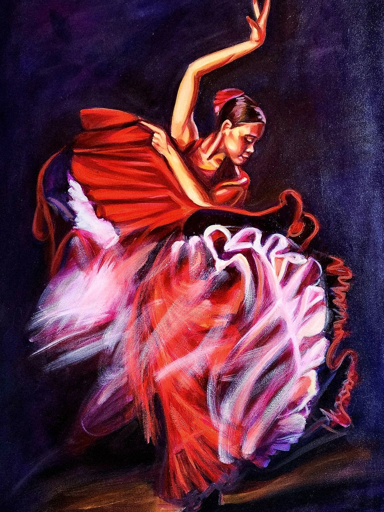 A flamenco dancer in a vibrant red dress gracefully moves.