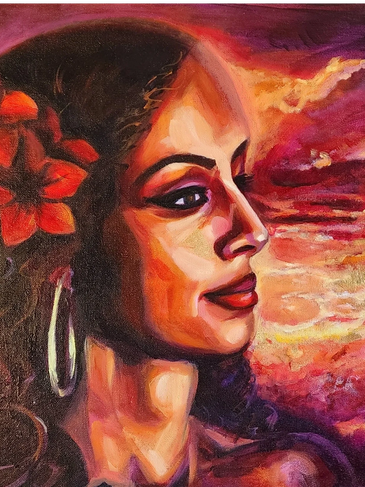 Portrait of a woman with a red flower in her hair.