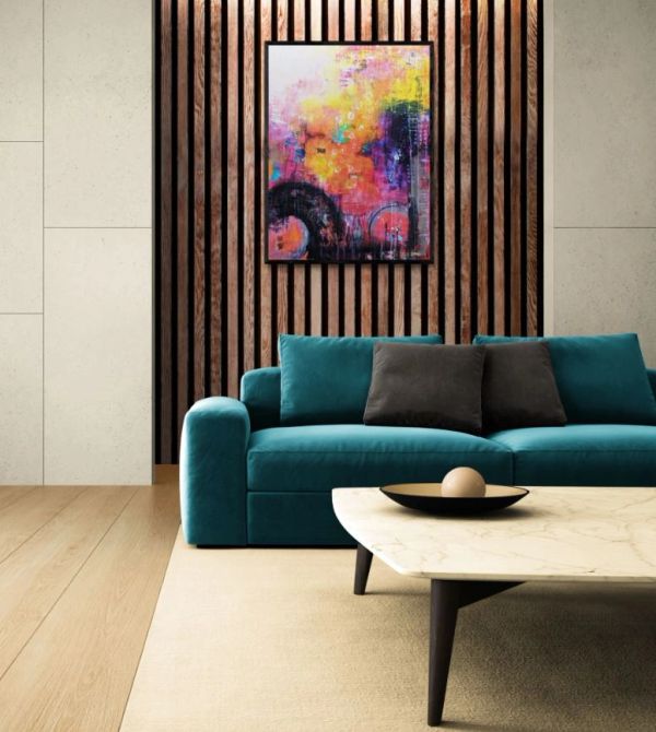 Modern living room with teal sofa and colorful abstract painting.