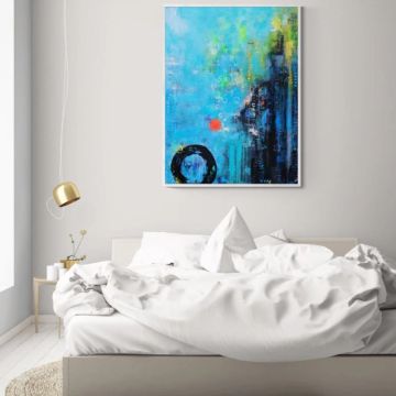 Minimalist bedroom with abstract blue painting above bed.