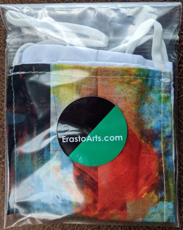 Colorful face mask in plastic packaging with ErastoArts.com sticker.