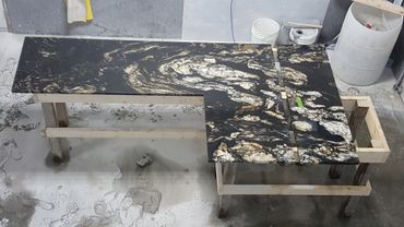 Countertop with bookmatched backsplash