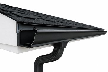 Close-up of roof gutter system with downspout.