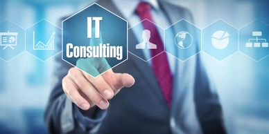 Businessman touching a digital IT Consulting interface.