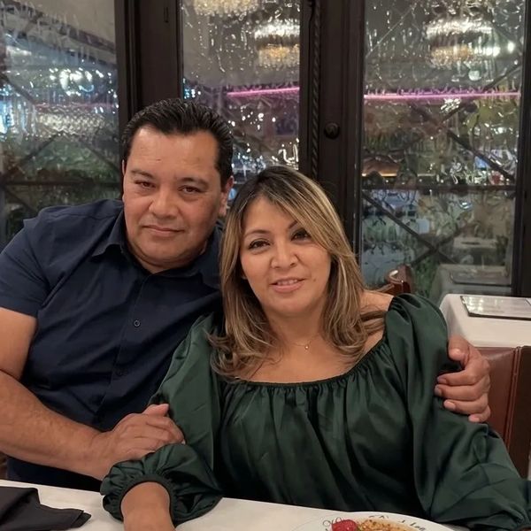 Couple enjoying a cozy dinner together.