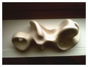 Small Clay Reclining Figure
Top
Private Collection