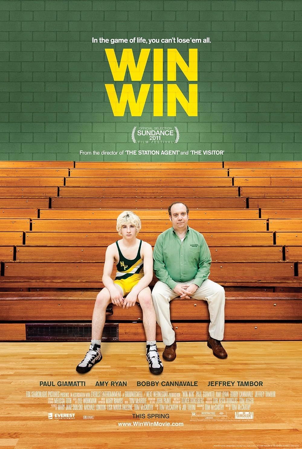 Movie poster for 'Win Win' featuring a wrestler and an older man on basketball bleachers.