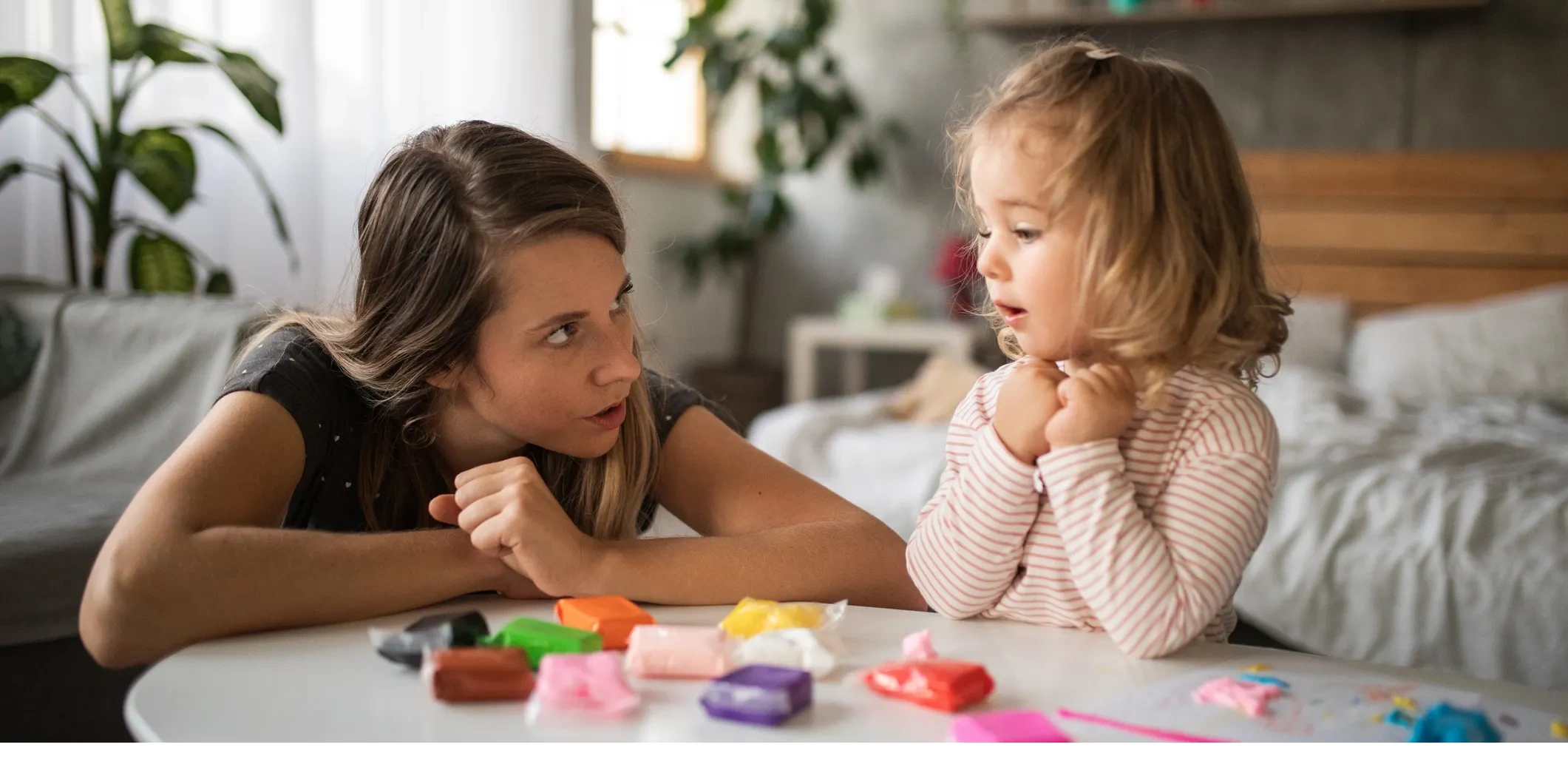 Greater Minnesota Family Services - Image of counselor and child