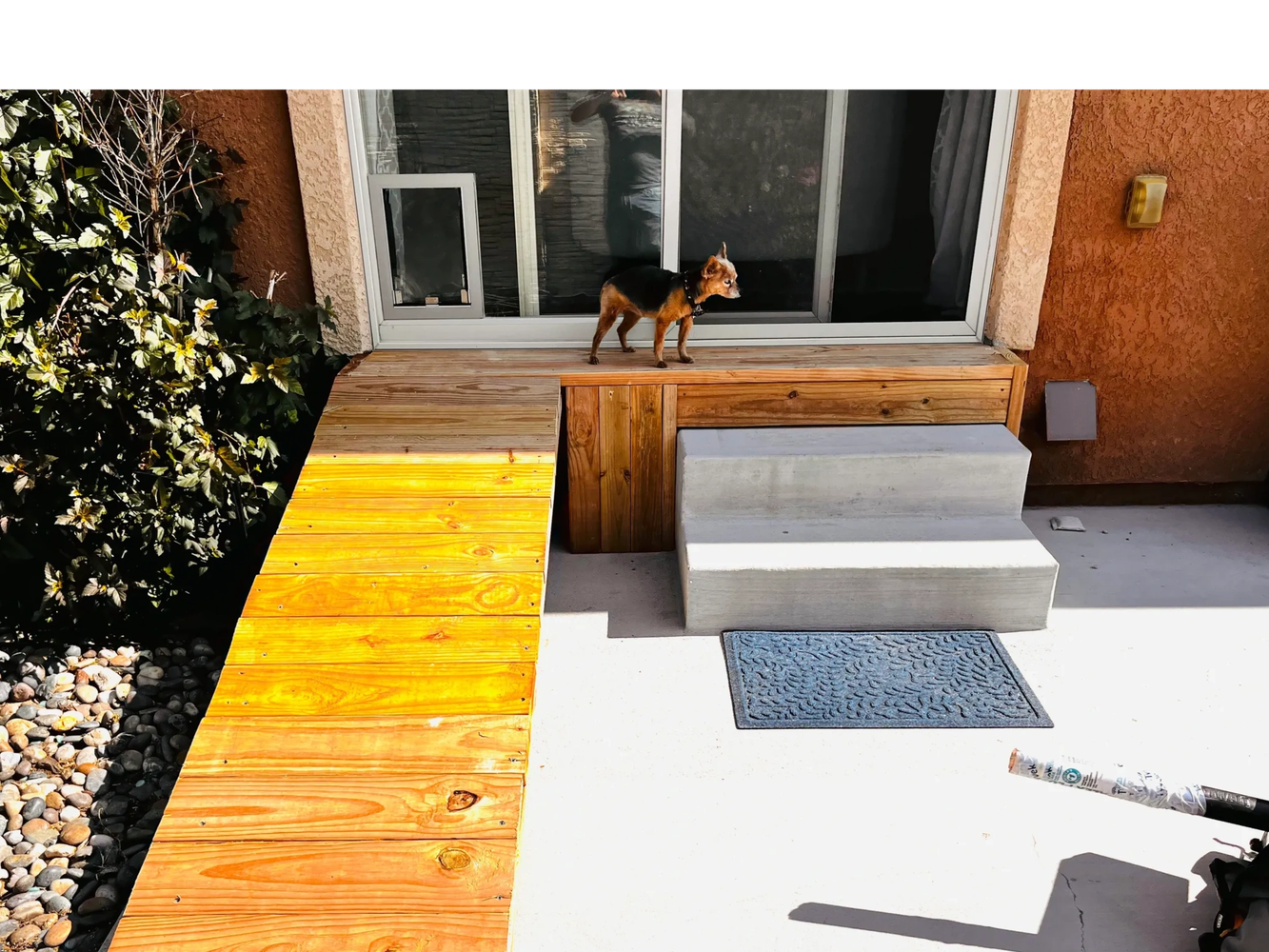 Insulated sliding glass door with a custom-made ramp for an old dog installed in Denver Colorado
