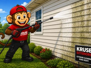 Cartoon monkey power washing a house's siding.
