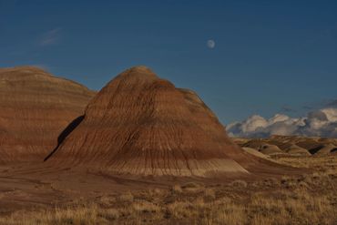 near full moon over badlands Petrified Forest National Park, Arizona from old US Highway 260