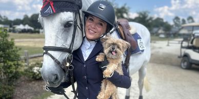 A women with horse and dog