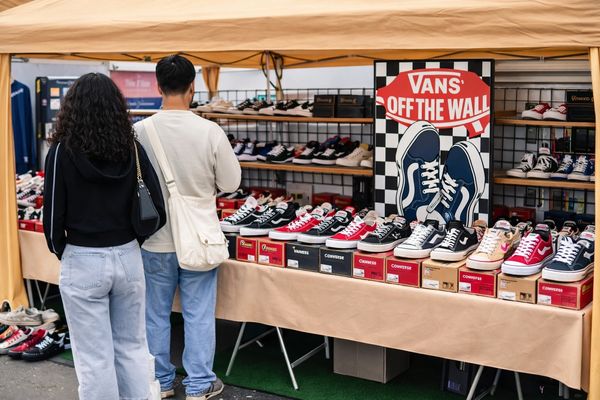 KixSupply booth displaying Vans sneakers at a local swap meet.