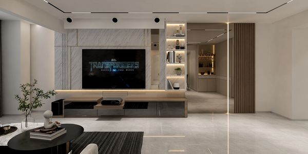 Modern living room with sleek TV setup and subtle lighting.