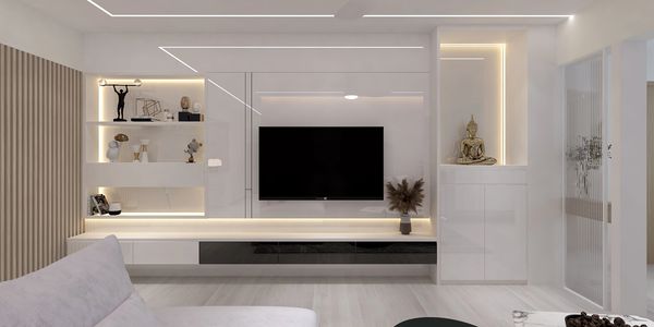 Modern minimalist living room with white and black decor and accent lighting.