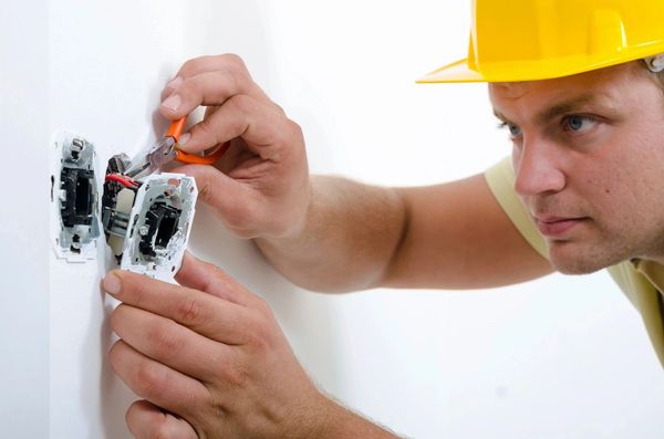 A man solving electrical issue