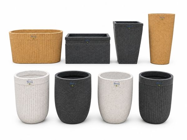 Eight stylish planters in black, beige, and white.