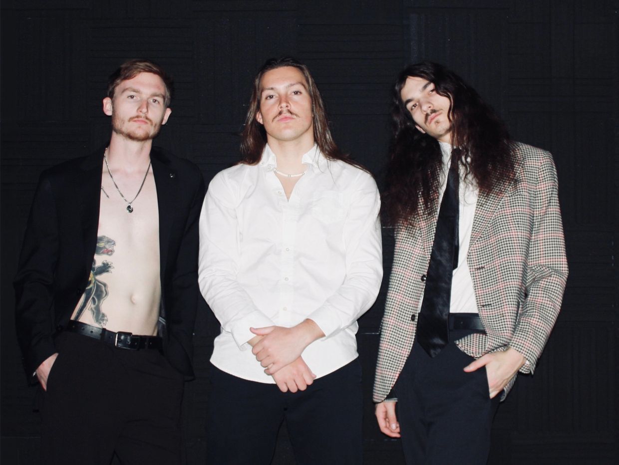 bandmates standing
