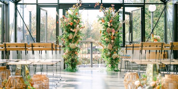 Ceremony set up with a beautiful floral arbor. 