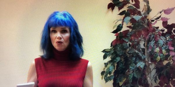 a woman with blue hair
