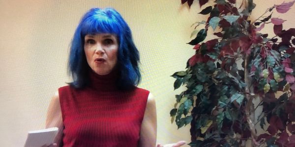 a woman with blue hair