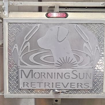 Logo of Morning Sun Retrievers with a dog's profile.