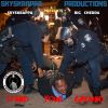 Protester being detained by police officers during a confrontation.