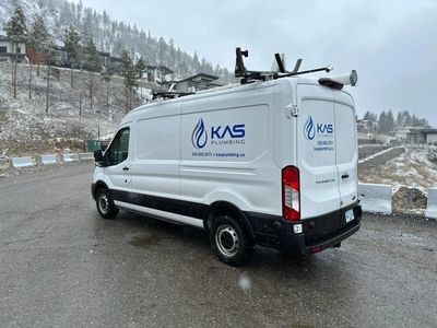 plumbing van parked in kelowna during the winter months