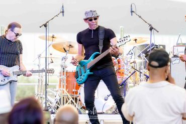 Live band performance with vibrant energy.