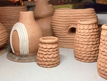 coiled pottery vessels can be textured or smooth