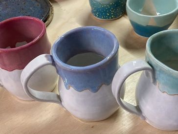 glazed pottery pieces can be fun and colourful and still be a set