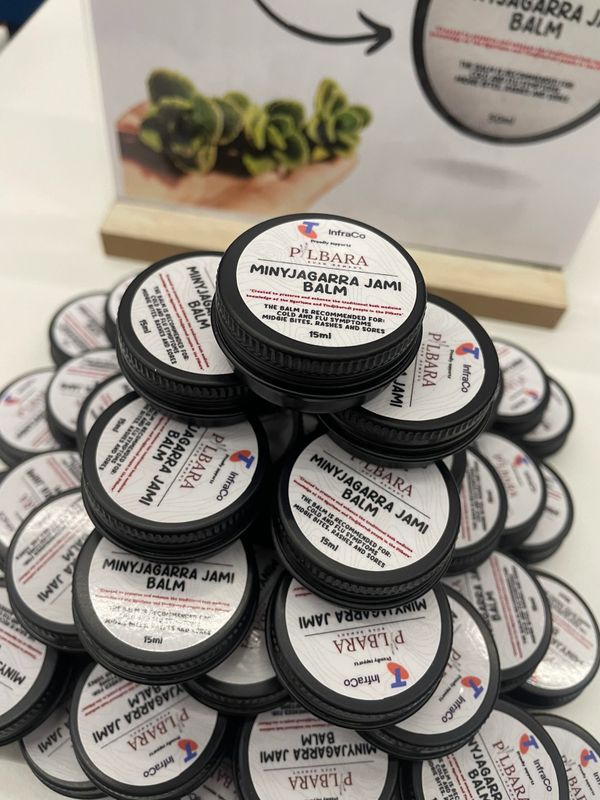 Stack of Minyjagarra Jami Balm containers on display.