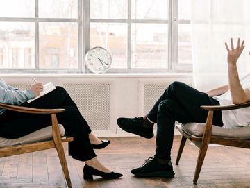 Photo by cottonbro studio: https://www.pexels.com/photo/person-in-black-pants-and-black-shoes-sittin