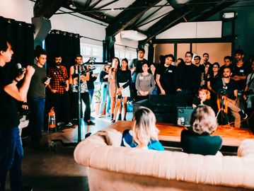 Photo by Matheus Bertelli: https://www.pexels.com/photo/group-of-people-standing-inside-room-2608517