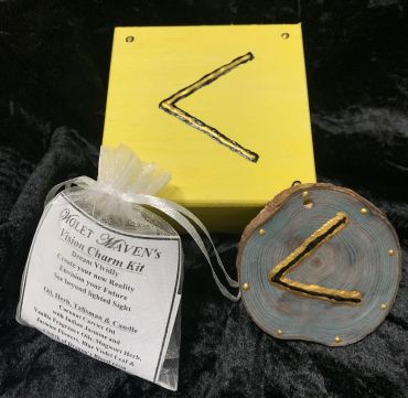 Violet Maven's Vision Charm Kit with wooden charm and yellow box.