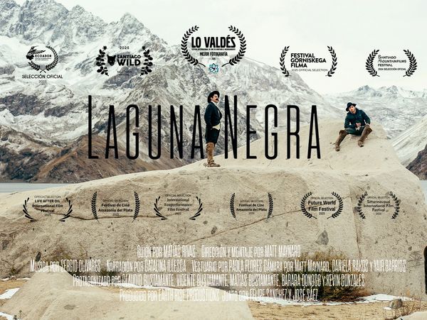Movie poster for Laguna Negra with two men on a rock in a mountainous landscape.