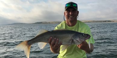 all eyes on fishing big bite and Brett Rye with a big walleye